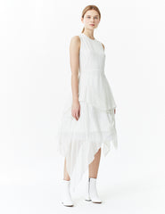 morgane le fay sleeveless silk chiffon dress with a draped skirt, crew neckline and waist tie. made in new york.